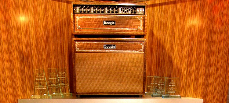 Dealer/Distributor Awards flanking an incredible Mark V head and 1x12 Extension with matching custom inlays